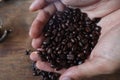 Coffee beans inÃ¢â¬â¹ hand, feel good